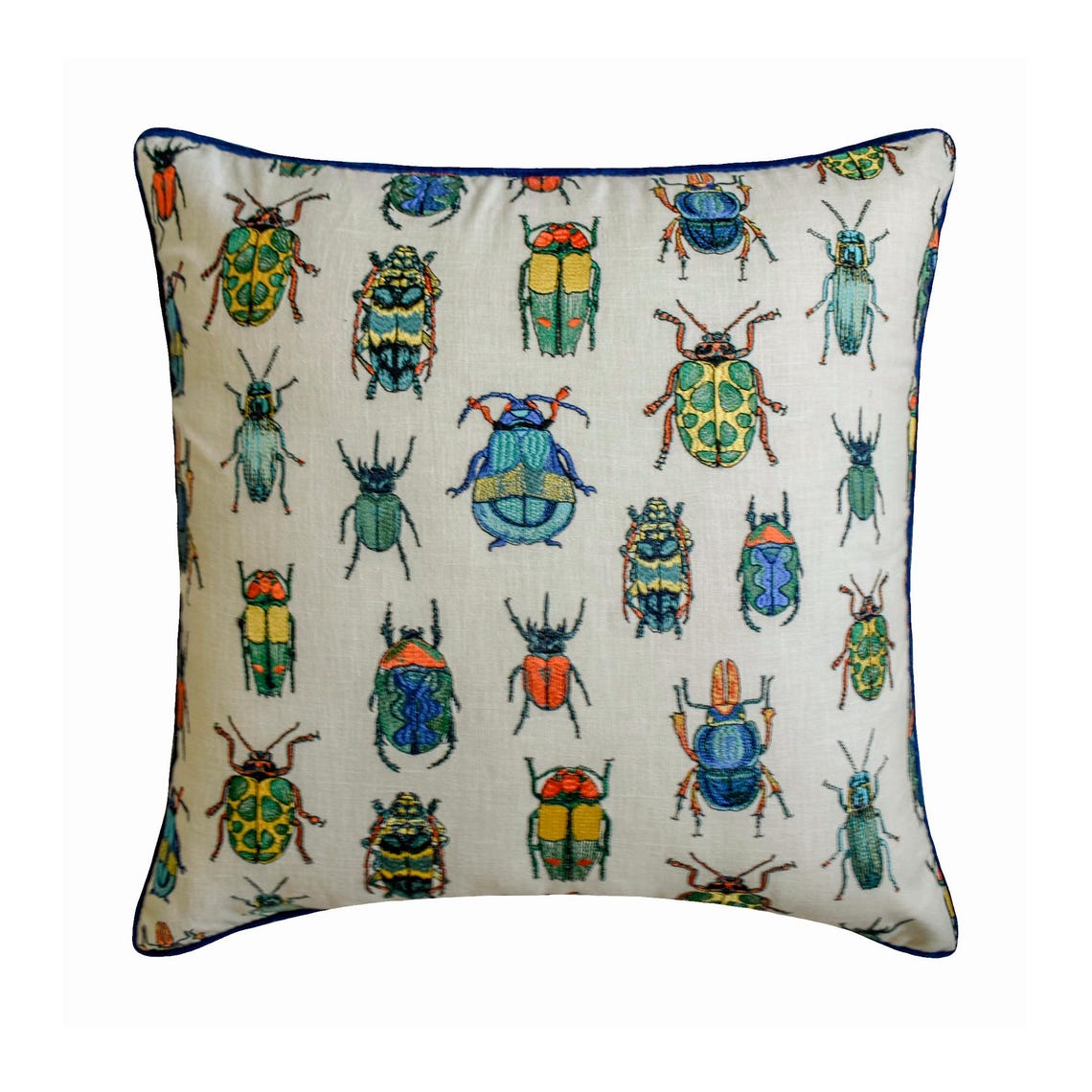 Close-up of a beetle-printed embroidered throw pillow cover with a beige background and colorful detailing.