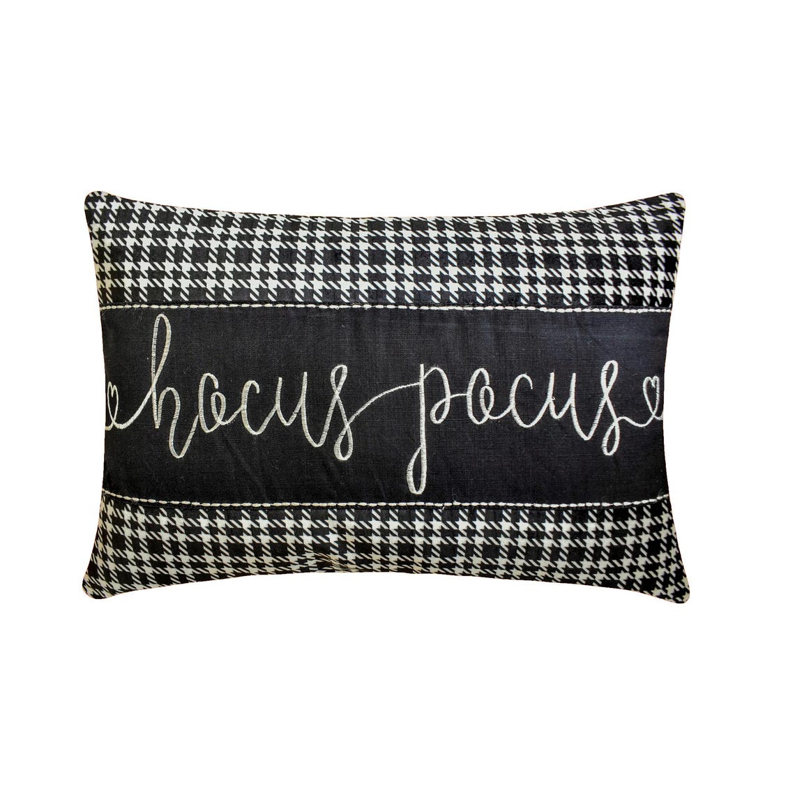 Simple black and white applique houndstooth pillow cover with embroidered 'Hocus Pocus' written in cursive, perfect for Halloween decoration.