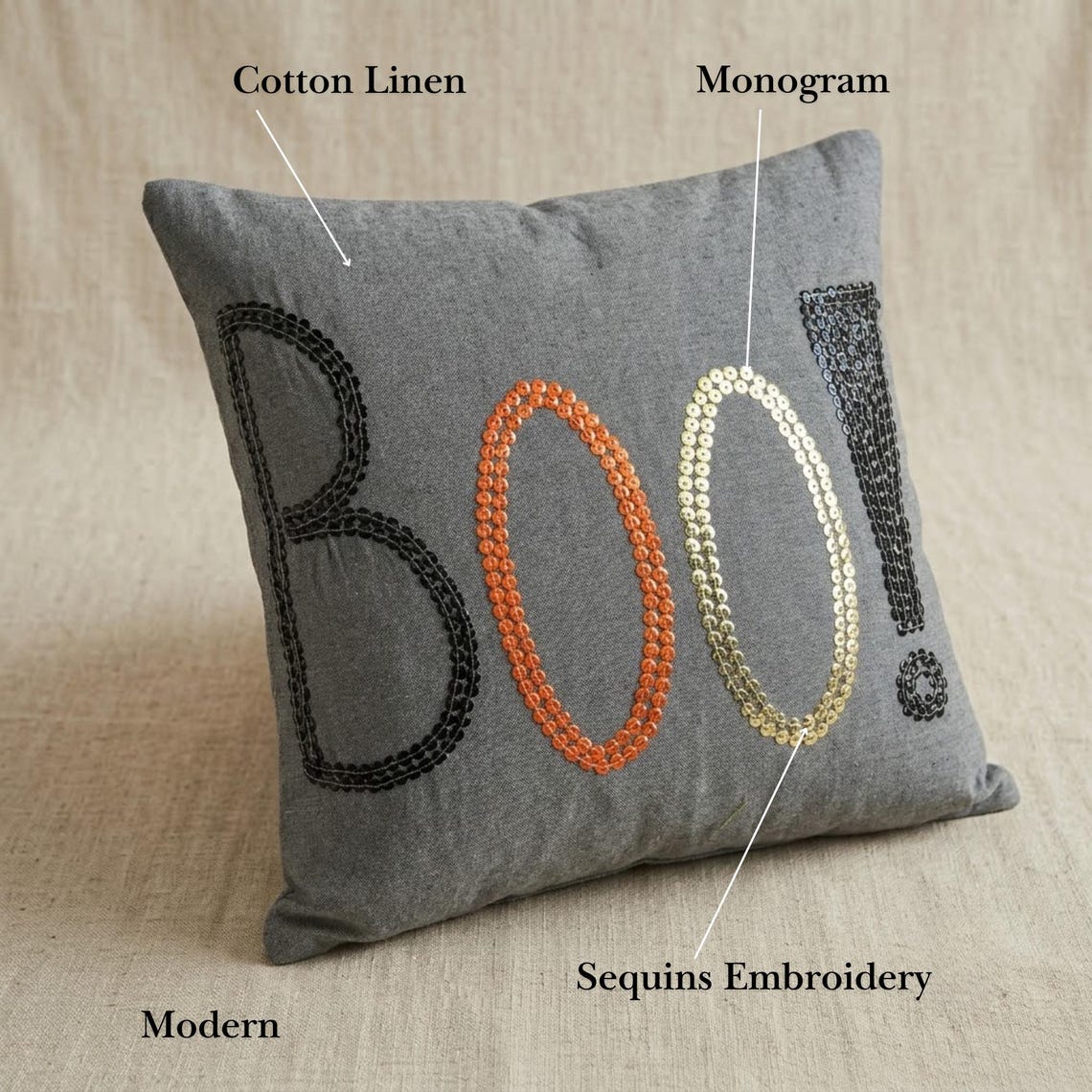 Spooky Halloween decorative pillow covers surrounded by festive Halloween decorations like pumpkins and spider web on a swing decorated with black & white checkered throw. 