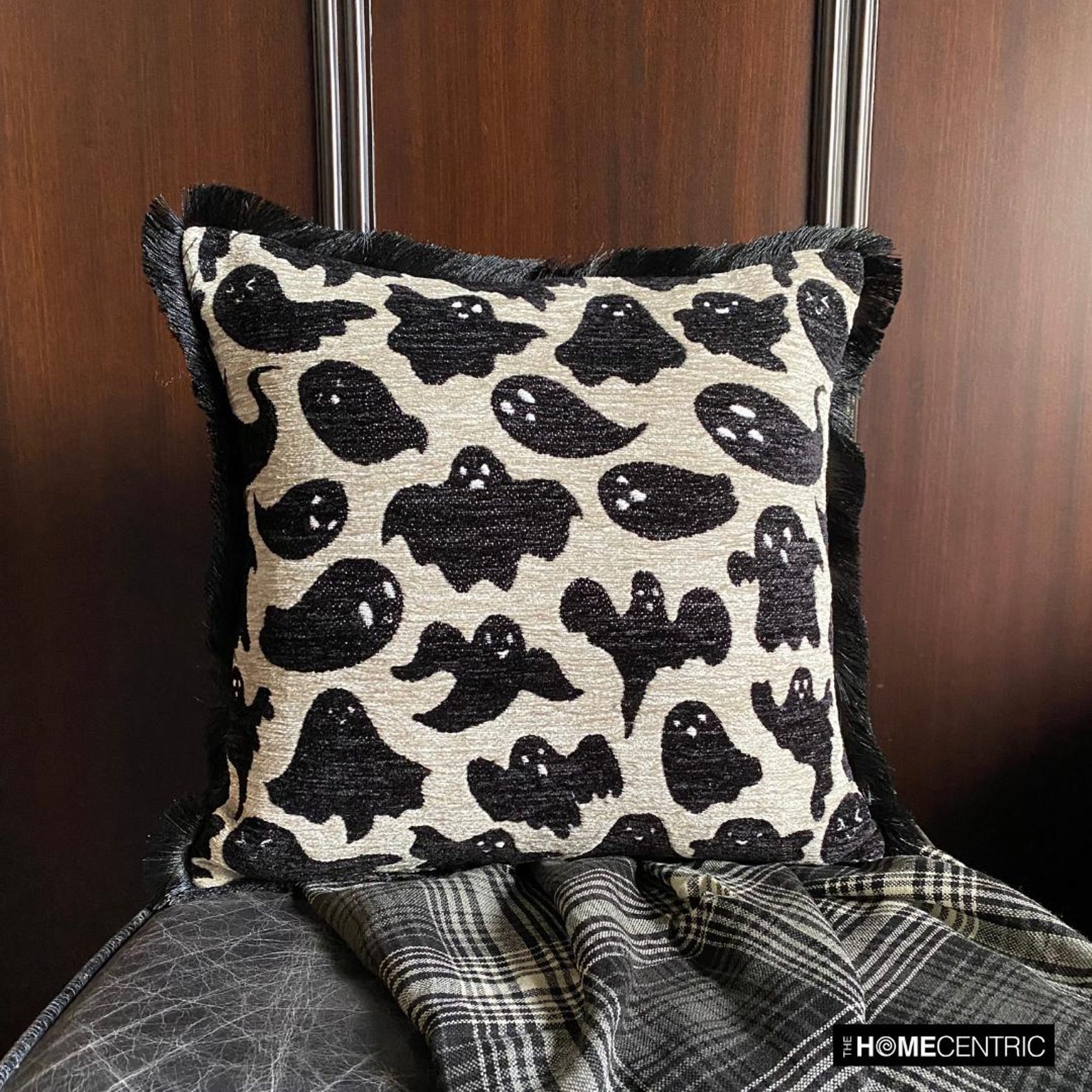 Halloween decorative throw pillow cover with spooky ghost design on a neutral jacquard fabric, finished with black lace border. 