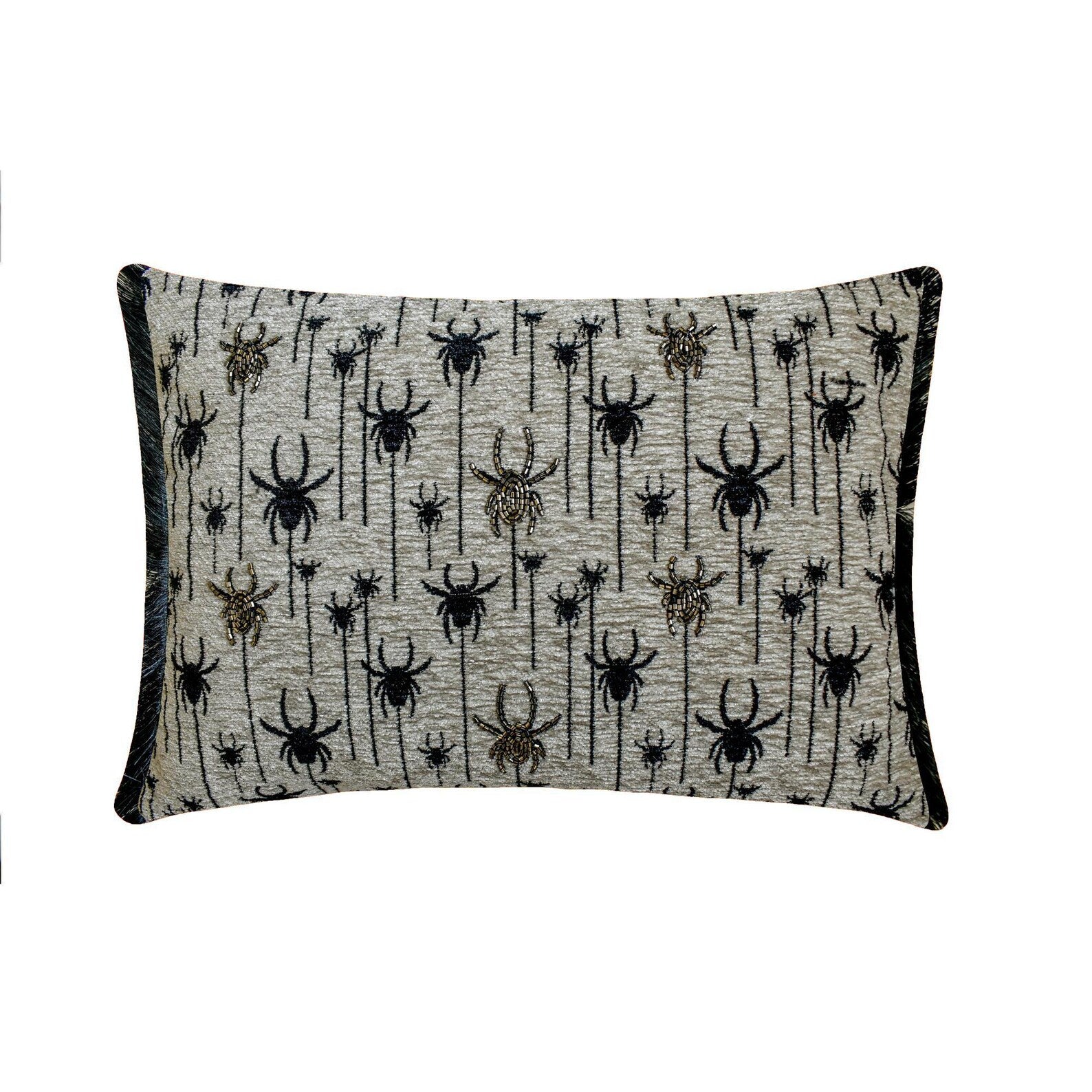 Halloween fireplace setting with spooky pillows featuring bat, Halloween ghosts and pumpkin motifs, draped with black decor around the fireplace. 